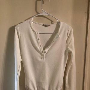 White snap up body suit.